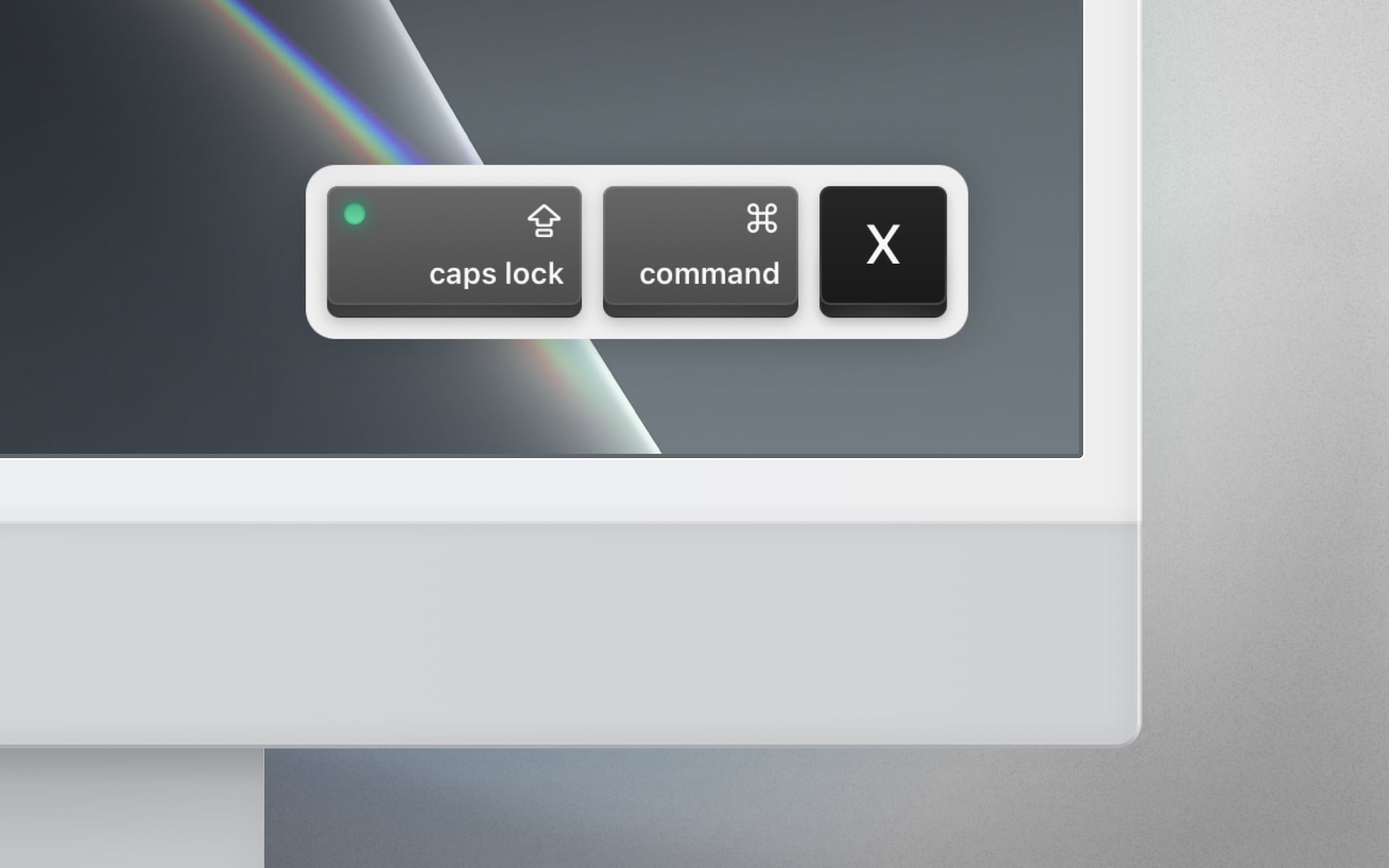 An image showing a keystroke visualization on an iMac screen.